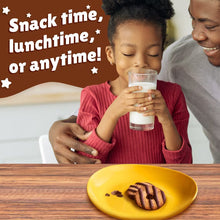Keebler Fudge Stripes cookie on yellow plate in snack-time family scene