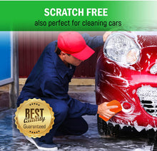 Orange microfiber sponge held while cleaning a car bumper area