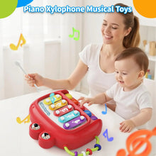 Red piano xylophone musical toy with colorful keys and bell-like percussion