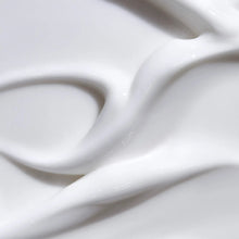Thick white lotion swirl with glossy smooth texture