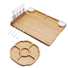 Bamboo charcuterie serving tray with slots for cheese knives and forks and a round tray