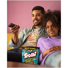 People relaxing on a couch with a gummy candy snack bag