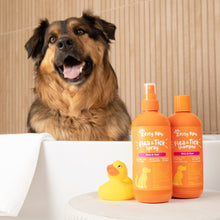 Flea and tick shampoo bottles with dog on towel