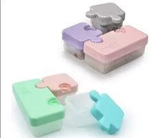 Puzzle food storage containers (2) with interlocking lids, pastel colors