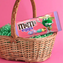 Peanut Butter M&M's Eggs candy bag in a wicker basket with green mascot