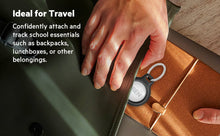 Black AirTag holder with key ring attached to a travel wallet
