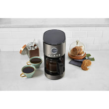 Black 12-cup drip coffee machine with carafe and filter basket