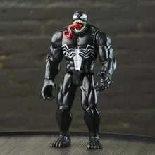 Black Venom action figure with red tongue and white chest webbing, standing