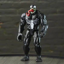 Venom action figure, black suit with white spider chest pattern and red mouth details