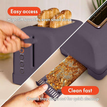 Plum 2-slice toaster with crumb tray sliding out and toasting lever