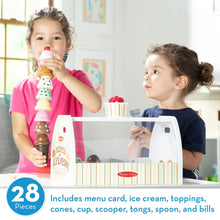 Wooden ice cream counter playset with pretend ice cream cones and scoops for play