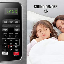 Microwave sound control graphic near keypad alongside two people resting