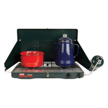Portable 2-burner propane stove with open lid, red pot, blue kettle, dark green