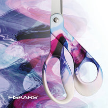 All-purpose scissors close-up with stainless blades and marbled pink-blue handles