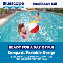 Inflatable beach ball in red, white, and yellow panels with blue valve in pool