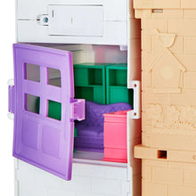 Kid Connection doll house play set, purple door opening to green and pink interior rooms