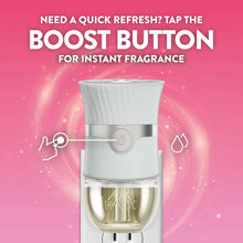Air Wick plug-in scented oil refill device with boost button