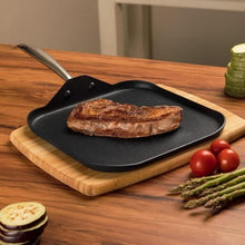 Square griddle pan with black nonstick surface and side handles