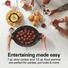 Open slow cooker crock filled with meatballs and plated appetizers on a table