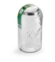 Ball mason jar with stainless lid and green label band, clear glass container
