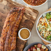Ground cumin spice bowl with ground cumin and seasoned food dishes