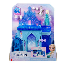 Frozen ice palace dollhouse playset shown in retail packaging with Elsa and Olaf