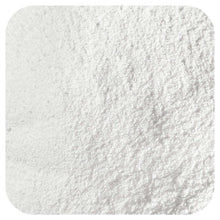 White creatine monohydrate powder, finely textured surface