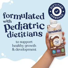 Kids nutrition shake carton held up with pediatric dietitian approval badge