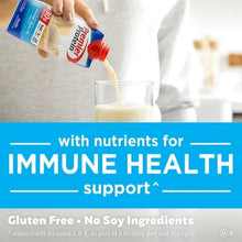 Vanilla protein shake carton pouring creamy drink into a glass