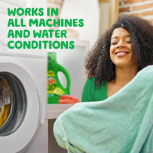 Gain liquid laundry detergent bottle near a front-load washing machine