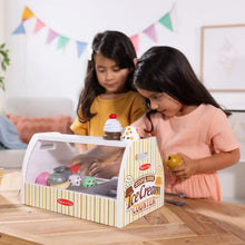 Wooden ice cream counter playset with pretend ice cream scoops and toppings for serving