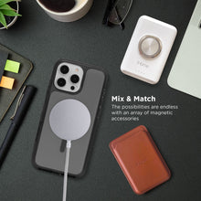 Black phone case with circular magnetic ring and camera cutouts, with attached strap