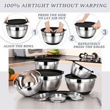 Stacked stainless steel mixing bowls with black airtight lids and grater attachments