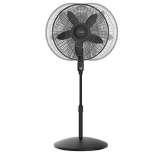 Black oscillating pedestal fan with protective grille and five-blade fan head