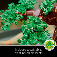 Close-up of LEGO bonsai tree leafy green elements on a brown trunk branch