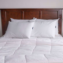 White cooling pillow with Serta logo tag