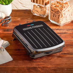 George Foreman 2-Serving Electric Indoor Grill with Non-Stick Plates, Panini Press, Space-Saving Slim Design, Drip Tray, Black Plastic Housing