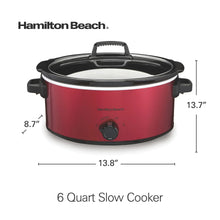 Red 6 qt slow cooker with glass lid and side handles on a countertop