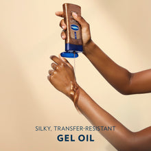 Vaseline Golden Hour Glow gel oil on skin, glossy golden bronze shimmer finish