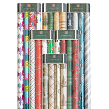 Holiday wrapping paper set with assorted Christmas patterns across multiple rolls