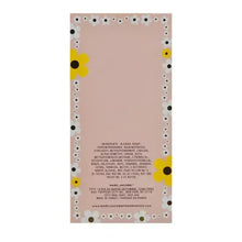 Perfume box back with ingredient text and floral border dots