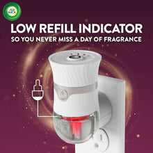 Air Wick plug-in scented oil warmer with low refill indicator light in clear reservoir
