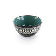 Blue sage stoneware double bowl with black exterior, white geometric rim, and green interior