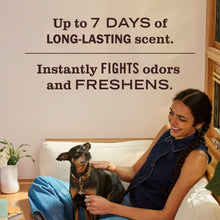 Fabric freshener promoting long-lasting scent, with woman and dog on couch.