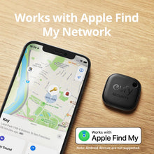 Black key finder tag beside a phone displaying a map