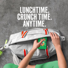 Snack pack in front pocket of a gray lunch tote with red trim and hand