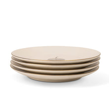 Stoneware dinner plates, cream with gray leaf medallion; stacked set of four