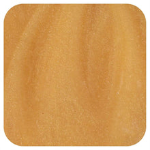 Amber honey close-up with granular texture.