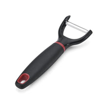 Stainless steel Y-peeler with black soft-grip handle and red accents