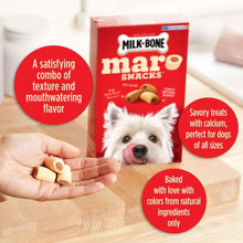 Milk-Bone MaroSnacks dog treat box with bone-shaped snacks in hands